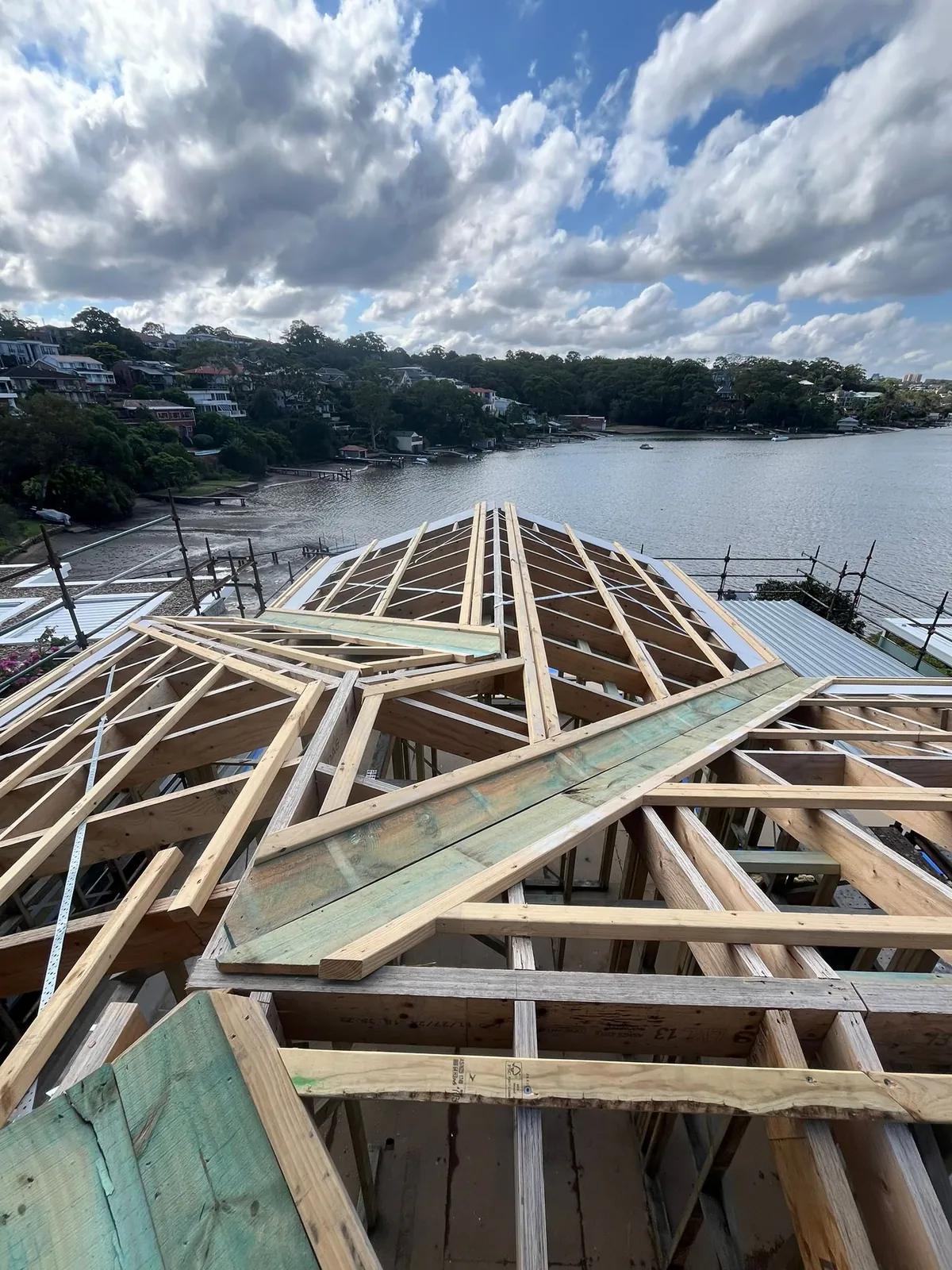 Complex roof framing with water views